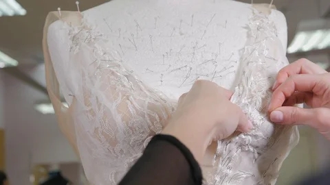 Close-up of needle and thread, embroider pattern. Equipment for sewing elegant Stock Footage 89929643