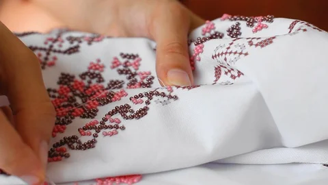 Close-Up Of Needle And Thread, Embroider Patterns With Beads. Handmade sewing Stock Footage 116430478