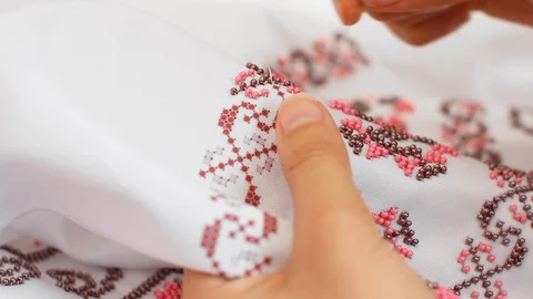 Close-Up Of Needle And Thread, Embroider Patterns With Beads. Handmade sewing Stock Footage 116431985