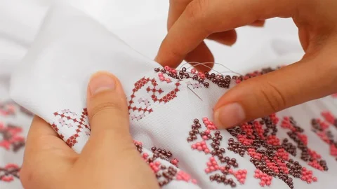 Close-Up Of Needle And Thread, Embroider Patterns With Beads. Handmade sewing Stock Footage 116432334