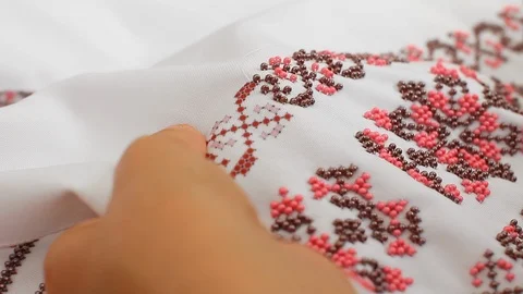 Close-Up Of Needle And Thread, Embroider Patterns With Beads. Handmade sewing Stock Footage 116432765