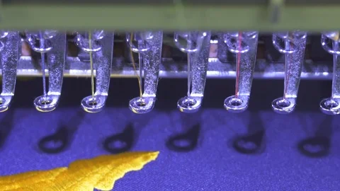 Close-up needle of Computerized machine embroidery on slow motion Video stock 107662626