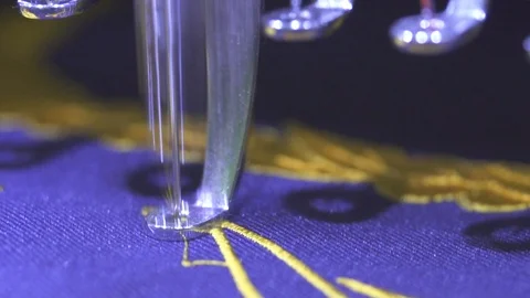 Close-up needle of Computerized machine embroidery on slow motion Video stock 107662711