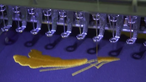 Close-up needle of Computerized machine embroidery on slow motion Video stock 107662740