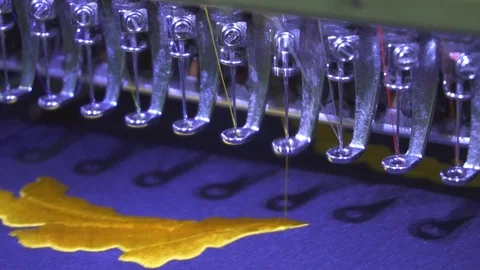 Close-up needle of Computerized machine embroidery on slow motion Video stock 107662821