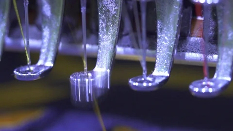 Close-up needle of Computerized machine embroidery on slow motion Video stock 107662975