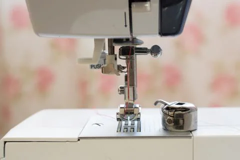Close up of a needle part of a sewing machine Stock Photos