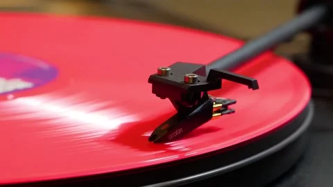 Close-Up: Needle on Pink Vinyl - Precision Sound Reproduction Stock Footage 275034235