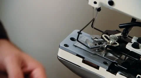 Close-up needle of a sewing machine Stock Footage 12377154