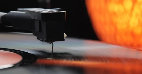 Close up on a needle of a turning table - vintage mood - 4K resolution 動画素材 103552409