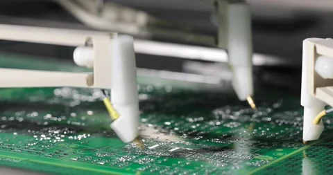 Close-up needles on automatic equipment production manufactoring of microchips. Stock Footage 202054192