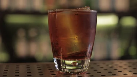 Close Up Of Negroni Cocktail Stock Footage 129781337