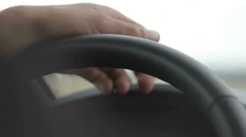 Close up of nervous hands on steering wheel Stock Footage 11495507