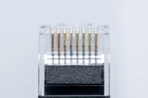 Close-up of a network cable connector for data transmission, RJ45 connector Stock Photos