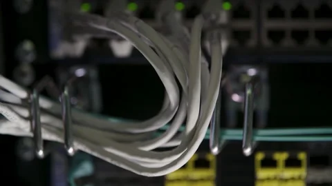Close-Up of Network Cables Organized in Server Rack Wiring at Data Center Stock Footage 334428772