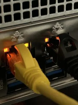 Close-Up Of Network Rack With Ethernet Cables And Active Lights In Data Center Stock Photos