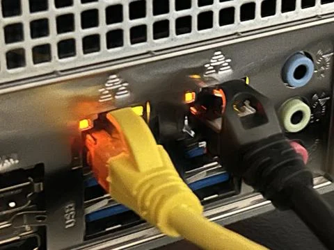 Close-Up Of Network Rack With Ethernet Cables And Active Lights In Data Center Stock Photos