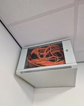 Close up of a network switch cabinet on a wall Stock Photos