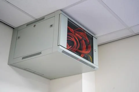 Close up of a network switch cabinet on a wall Stock Photos