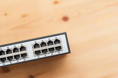 Close-up of networking equipment installation in professional office space .. Stock Photos