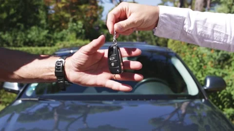 Close Up Of New Car Keys Being Exchanged Stock Footage 68772161