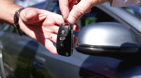 Close Up Of New Car Keys Being Exchanged Stock Footage 68772173