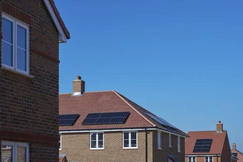 Close Up Of New Housing Development Including Solar Energy Panels On Roof Stock Photos