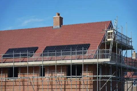 Close Up Of New Housing Development Including Solar Energy Panels On Roof Stock Photos