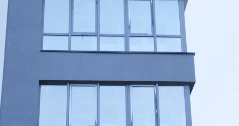 Close up, new metal-plastic windows in modern building outdoors. Black window Stock Footage 263130408