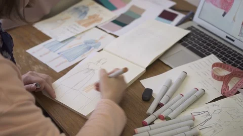 Close up of new model of dress is being created by female fashion designer. Stock Footage 88569766
