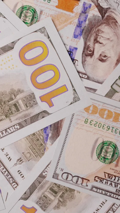 Close up of new US hundred dollar bills. Looped video Video stock 260628879