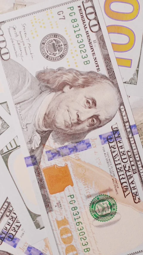 Close up of new US hundred dollar bills. Looped video Stock Footage 260628882