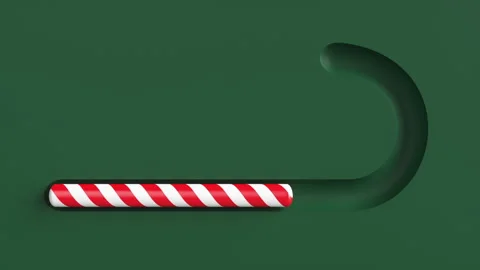 Close-up of New Year candy on a green background. 스톡 동영상 253998724