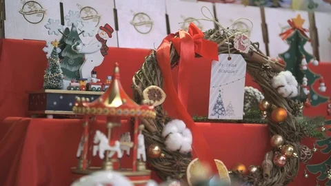 Close-up of New year souvenirs on shelf for sale Stock Footage