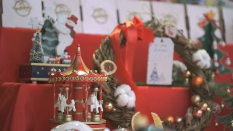 Close-up of New year souvenirs on shelf for sale Stock Footage