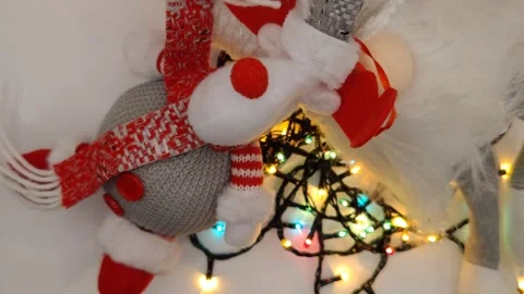 Close-up of New Year's decorations made of toys and flashing lights Stock Footage 322540318