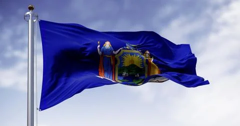 Close-up of New York State flag waving on a clear day Stock Illustration