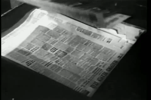 Close-up of newspapers printed on printing press Видео 14521426