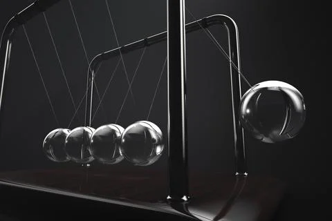 Close-up of Newton's cradle in action Stock Photos