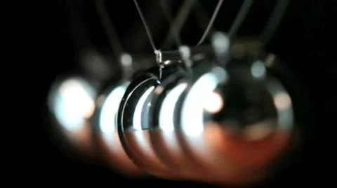 Close up of Newton's Cradle Pendulum Desk Toy Stock Footage