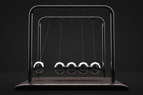 Close-up of Newton's pendulum. Dark background. 스톡 사진