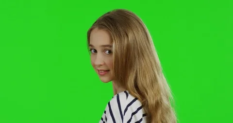 Close up of the nice pretty schoolgirl with long fair hair and in the striped Video stock 89943467