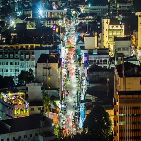 Close-up night timelapse of car traffic in Phuket town, Thailand 스톡 동영상 69575562