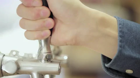 Close-Up of Nitro Coffee Pouring from Tap Stock Footage 138261543