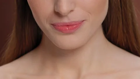Close up on a no make up lips of a beautiful smiling model. Girl with perfect Video stock 147604049