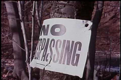 Close-up of no trespassing sign on tree Stock Footage 11354191
