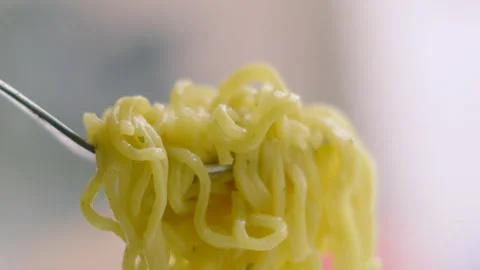 Close Up Noodles on Fork Static Before Gently Rising Out of Shot. Stock Footage 318224131