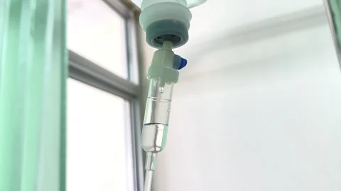 Close Up Normal Saline IV Drip Infusion for Patient Hydration and Medical Care Stock Footage 328307309