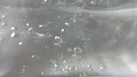 Close up normal speed bubbles under water Stock Footage 114217502