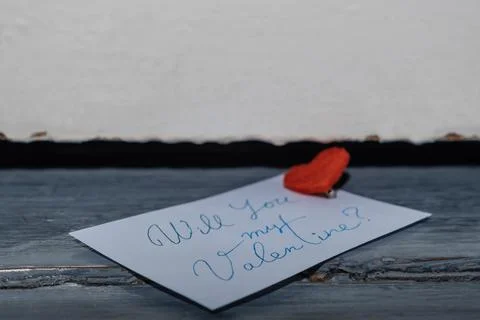 Close-up of note with ink and pen inscription Will you be my Valentine with a 写真素材